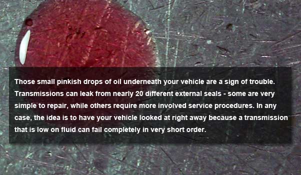 transmission warning sign 1 - car leaking pinkish oil